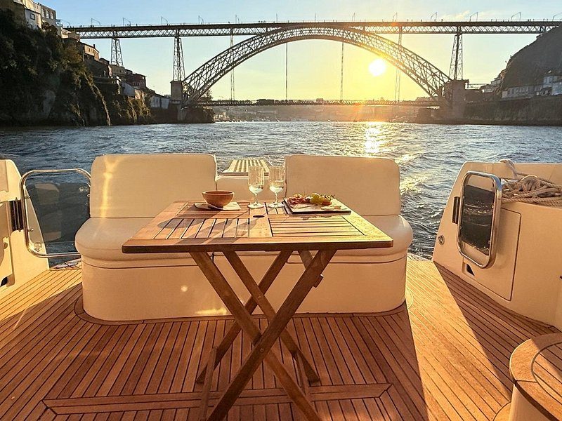 A table set on a Douro river boat as the light goes
